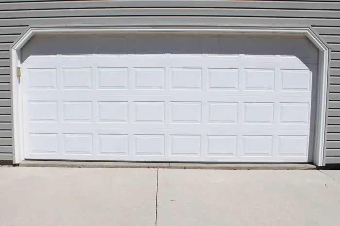 Same garage apron slab raised back to the door line after polyfoam lifting