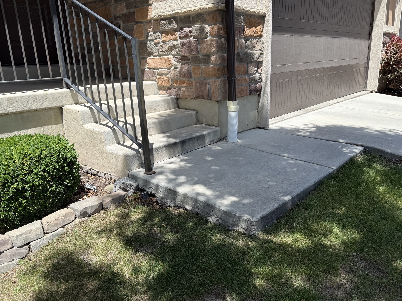 Front entry pad detail after lifting, Lehi